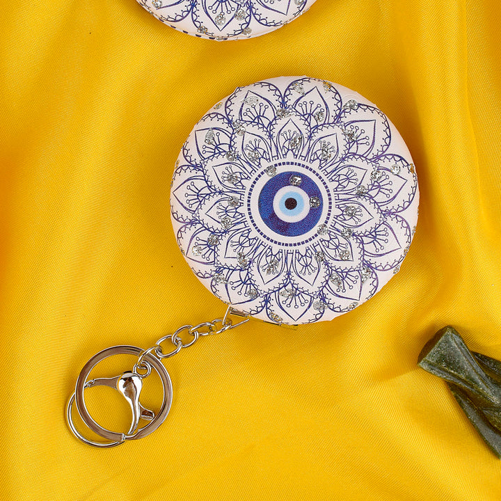 Round Evil Eye Keychain with Foldable Mirror – Stylish and protective keychain, perfect for daily use and gifting. India’s Largest Pooja Accessories Brand – www.satvikstore.in