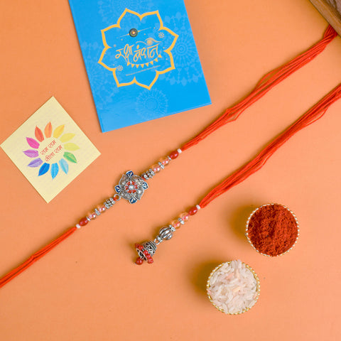 Designer Couple Rakhi Set for Bhaiya and Bhabhi with Roli Chawal and Ram Sita Stickers – Raksha Bandhan Gift Combo. India’s Largest Brass Idols Brand - www.satvikstore.in