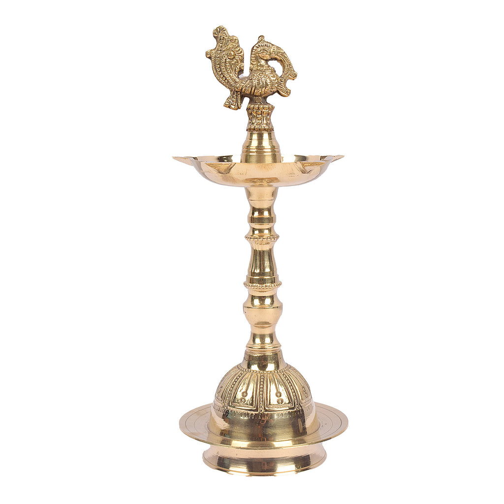 9.5 Inch Embossed Brass Peacock Kerala Samai Diya – Handcrafted brass diya with an embossed peacock design, perfect for pooja ceremonies, religious rituals, and spiritual occasions. India’s Largest Pooja Accessories Brand – www.satvikstore.in