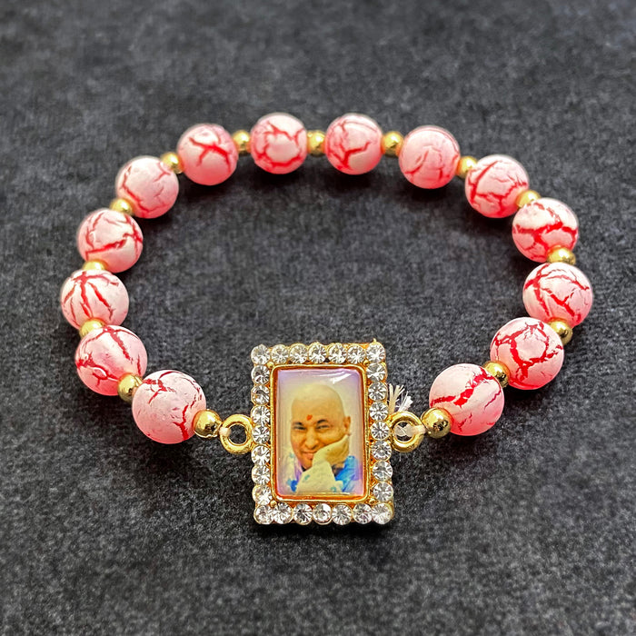 Strawberry Pink Bracelet with Jai Guruji Swaroop