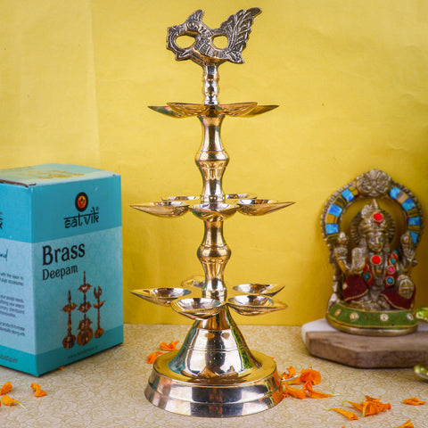 Brass 3 Step Panchmukhi Peacock Kerala Diya – Handcrafted brass diya with a three-step structure, Panchmukhi (five-faced) design, and peacock motif, perfect for pooja rituals, temple lighting, and traditional décor. India’s Largest Pooja Accessories Brand – www.satvikstore.in