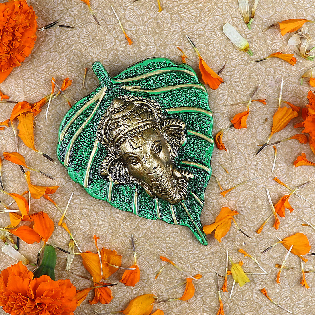 1 Pc Lord Ganesh Face on Leaf Patta Wall Hanging - Blue