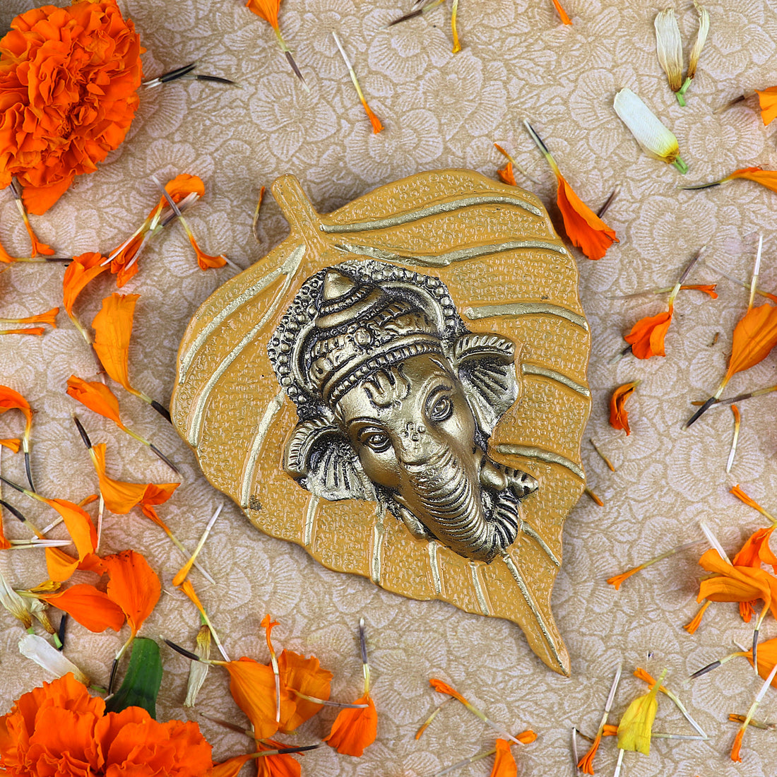 1 Pc Lord Ganesh Face on Leaf Patta Wall Hanging Yellow