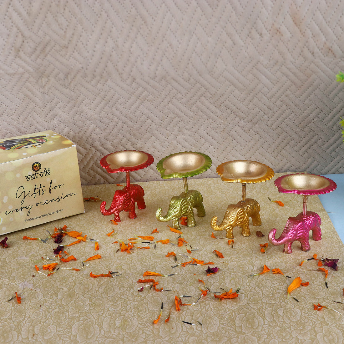 Spectacular Assorted Metal Elephant with Diya Showpiece Set of 4